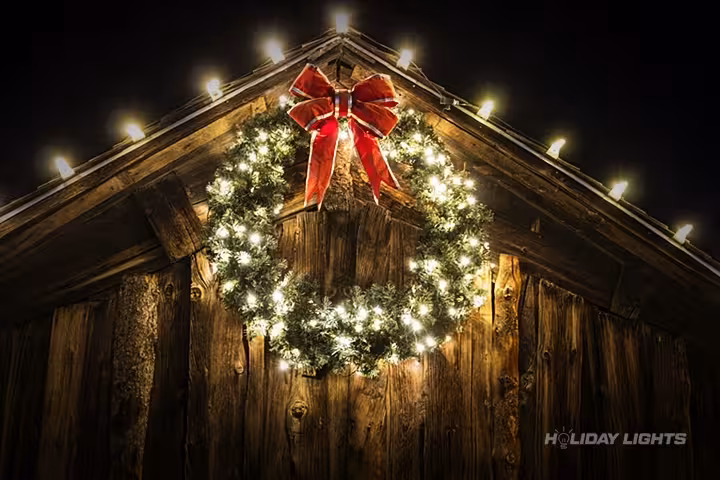 Barn Roofline Christmas Lights Wreath Warm White - Residential Christmas lights installation in Massachusetts