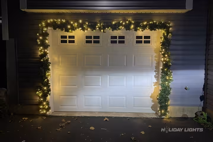 Garage Door Garlands Decoration - Residential Christmas lights installation in Massachusetts