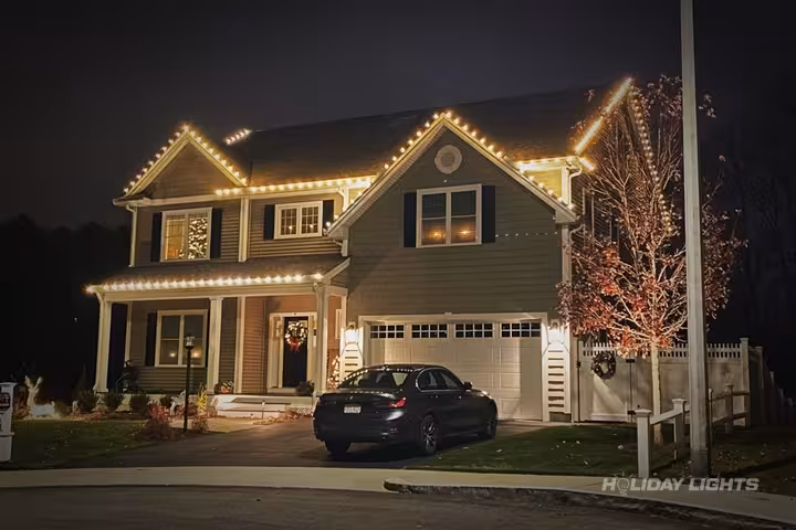 Roofline Decoration - Residential Christmas lights installation in Massachusetts
